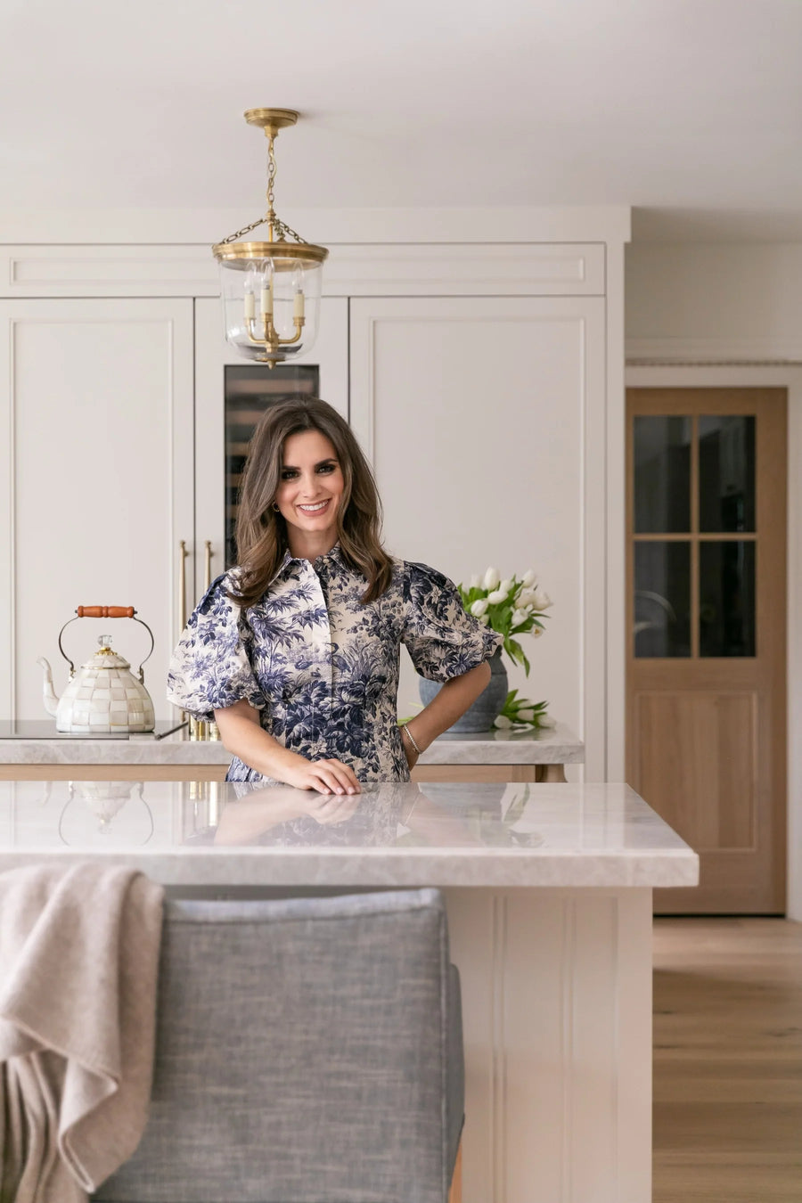 Interior designer Alicia Torosian in a kitchen she designed